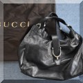 H03. Gucci leather handbag. 